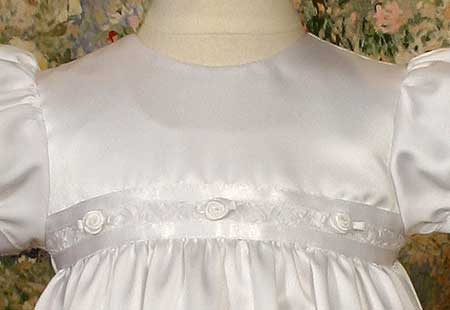 Satin gown w/ rosette trim. - 3 Month Sizing Only