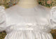 Satin gown w/ rosette trim. - 3 Month Sizing Only