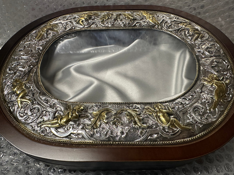 Sterling Silver Oval Case with Gold Plated Angels